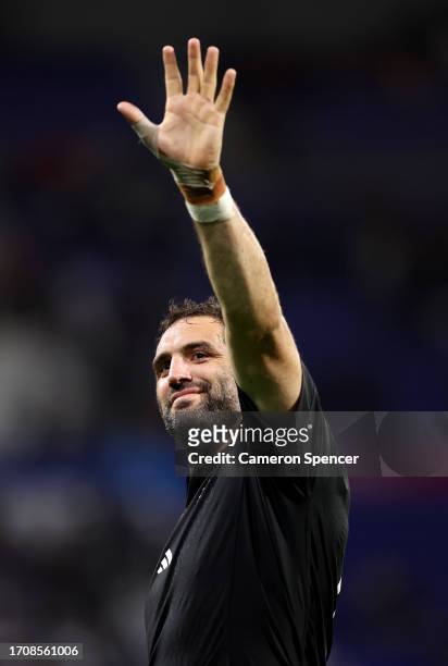 Samuel Whitelock of New Zealand acknowledges the fans after making his Record Breaking 149th Appearance for the New Zealand All Blacks, overtaking...