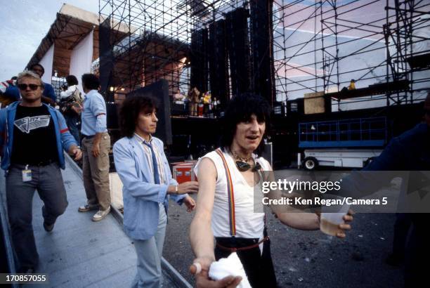 Ron Wood and Bill Wyman of the Rolling Stones are photographed on June 25-26, 1982 backstage at Wimbley Stadium in London, England. CREDIT MUST READ:...