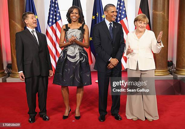 Joachim Sauer, U.S. First Lady Michelle Obama, U.S. President Barack Obama and German Chancellor Angela Merkel attend the dinner given in honour of...