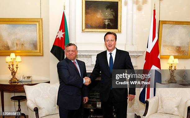 Prime Minister David Cameron attends a meeting with King Abdullah II of Jordan at 10 Downing Street on June 19, 2013 in London, England. As well as...