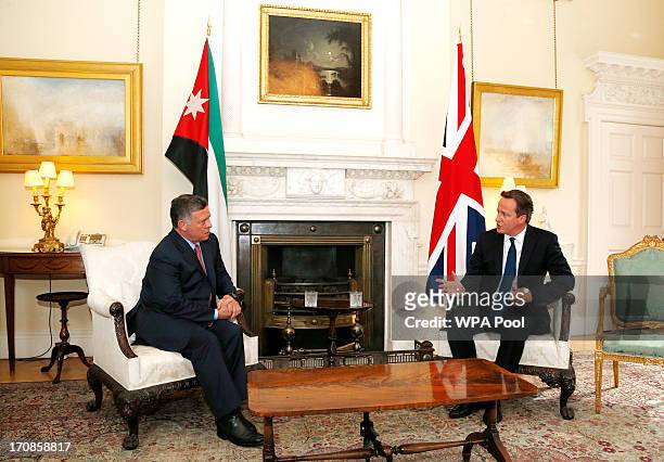 Prime Minister David Cameron attends a meeting with King Abdullah II of Jordan at 10 Downing Street on June 19, 2013 in London, England. As well as...