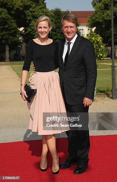 German politician Ronald Pofalla and Nina Hebisch attend the dinner given in honour of U.S. President Barack Obama at the Orangerie of Schloss...