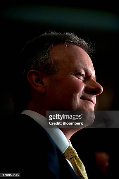 Stephen Poloz, governor of the Bank of Canada, smiles as he delivers his first speech as governor at the Oakville Chamber of Commerce luncheon in...