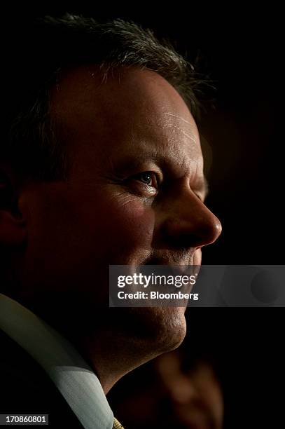 Stephen Poloz, governor of the Bank of Canada, smiles as he delivers his first speech as governor at the Oakville Chamber of Commerce luncheon in...