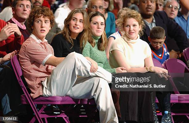 Model Lauren Bush and friends sit courtside during the NBA game between the Boston Celtics and the New York Knicks at Madison Square Garden on...