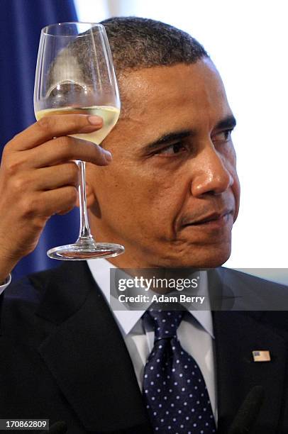 President Barack Obama gives a toast at a dinner at the Orangerie at Schloss Charlottenburg palace on June 19, 2013 in Berlin, Germany. Obama is...