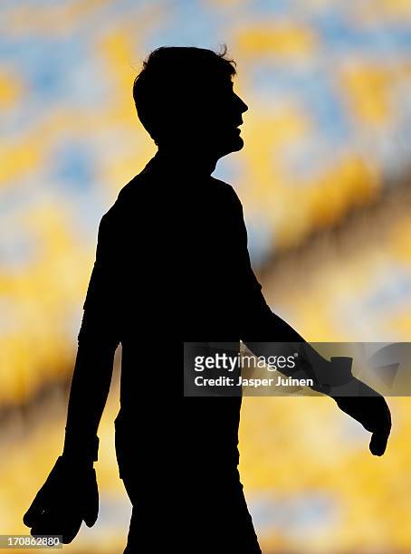Silouet of goalkeeper Iker Casillas of Spain during a training session, ahead of his team's FIFA Confederations Cup Brazil 2013 game against Tahiti,...
