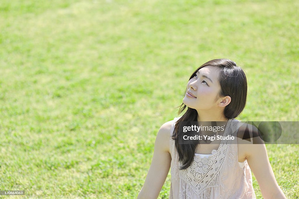 Woman sitting in the nature