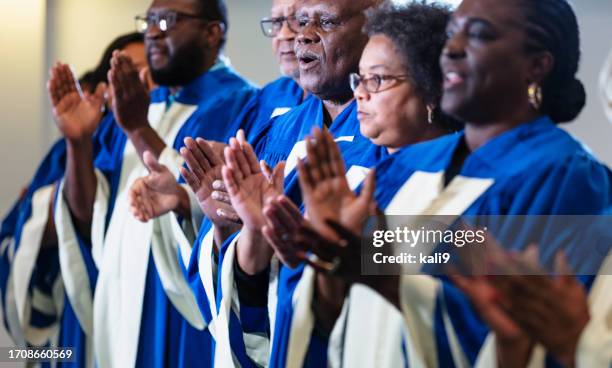 group of black men and women singing in church choir - gospel singer stock pictures, royalty-free photos & images