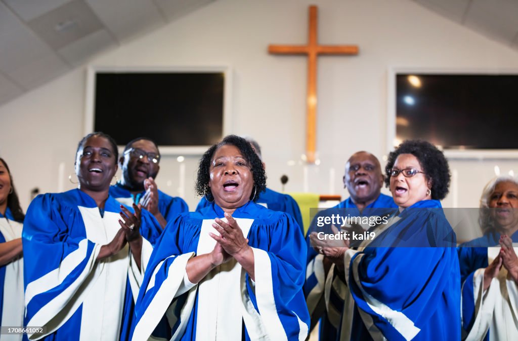 Senior African-American woman singing in church choir