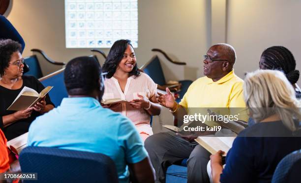 black men and women in group bible study - congregation stock pictures, royalty-free photos & images