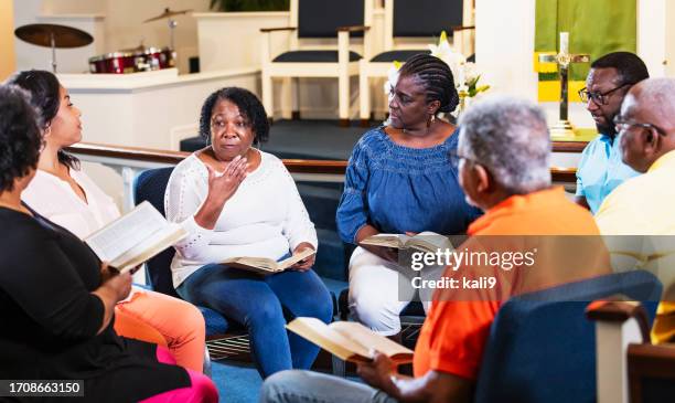 black men and women in group bible study - congregation stock pictures, royalty-free photos & images