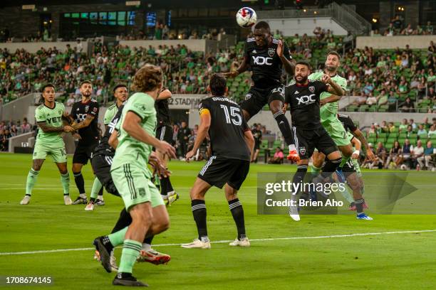 Untied Christian Benteke leaps for a header during the first half of the MLS match between Austin FC and D.C. United at Q2 Stadium on October 4, 2023...