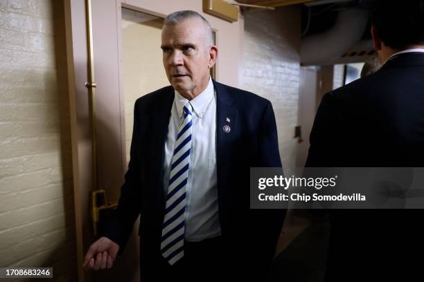 House Freedom Caucus member Rep. Matt Rosendale walks past reporters on his way to an afternoon Republican caucus meeting at the U.S. Capitol on...