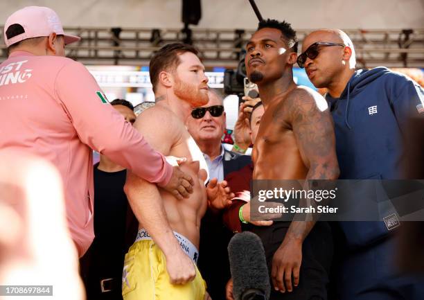 Undisputed super middleweight champion Saul “Canelo” Alvarez of Mexico and Jermell Charlo face off during their weigh-in at Toshiba Plaza on...