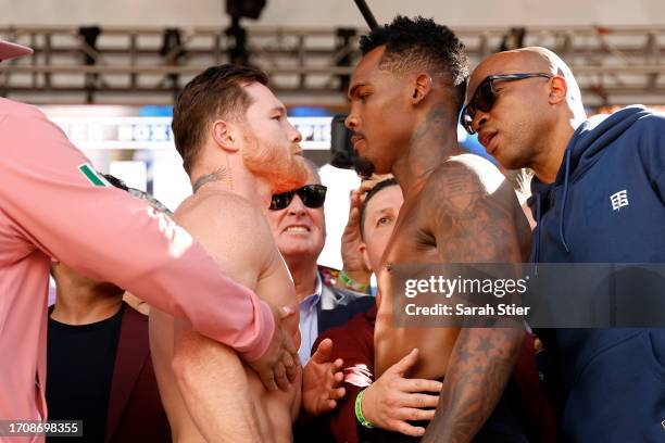 Undisputed super middleweight champion Saul “Canelo” Alvarez of Mexico and Jermell Charlo face off during their weigh-in at Toshiba Plaza on...