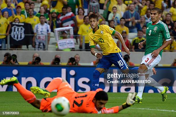 Brazil's forward Neymar tries to score past Mexico's goalkeeper Jose Corona only to see the ball go out, during their FIFA Confederations Cup Brazil...