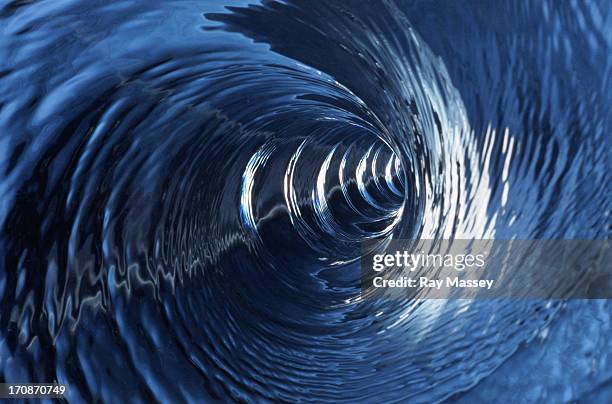 whirlpool tube - draaikolk stockfoto's en -beelden