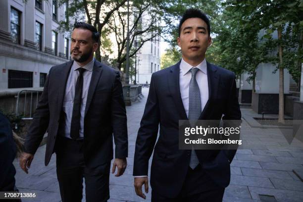 Matt Huang, co-founder and managing partner of Paradigm Operations LP, right, arrives at court in New York, US, on Thursday, Oct. 5, 2023. Former FTX...