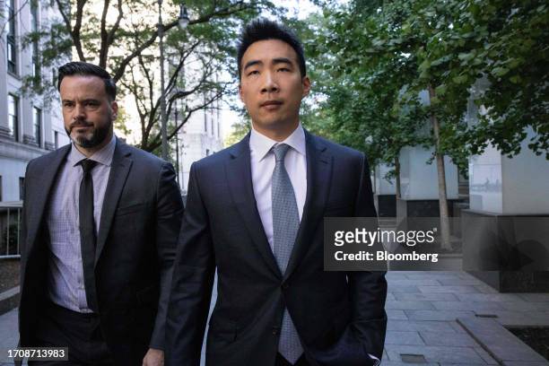 Matt Huang, co-founder of Paradigm Operations LP, right, arrives at court in New York, US, on Thursday, Oct. 5, 2023. Former FTX Co-Founder Sam...