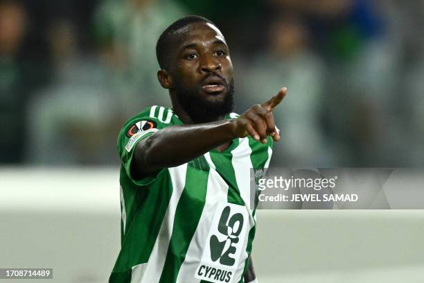 Aris Limassol's Gabonese forward Shavy Babicka celebrates after scoring his team's second goal during the UEFA Europa League Group C football match...