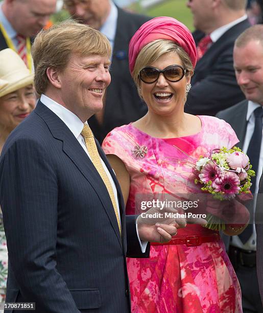 King Willem-Alexander of The Netherlands and Queen Maxima of The Netherlands make at official visit to the town centre on June 19, 2013 in...