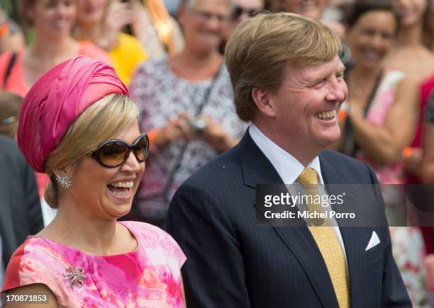King Willem-Alexander of The Netherlands and Queen Maxima of The Netherlands make at official visit to the town centre on June 19, 2013 in...