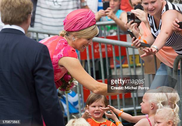 King Willem-Alexander of The Netherlands and Queen Maxima of The Netherlands make an official visit to the town centre on June 19, 2013 in...