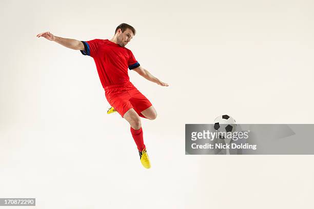 flying sports, football 09 - man studio shot stock pictures, royalty-free photos & images