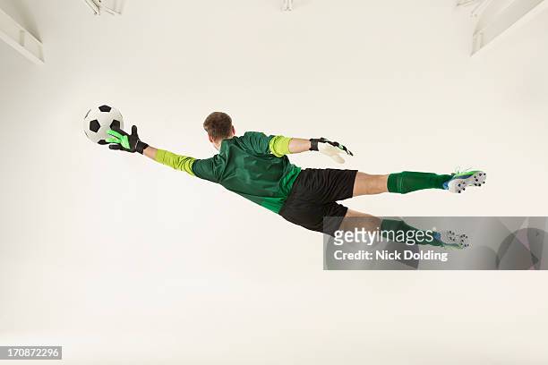 flying sports, football 18 - goalie goalkeeper football soccer keeper stock pictures, royalty-free photos & images