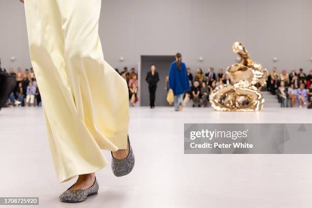 Model, shoe detail, walks the runway during the Loewe Womenswear Spring/Summer 2024 show as part of Paris Fashion Week on September 29, 2023 in...