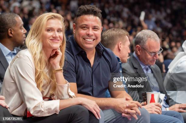 Former Brazilian football player Ronaldo watches the NBA Preseason basketball match between Minnesota Timberwolves and Dallas Mavericks at Etihad...