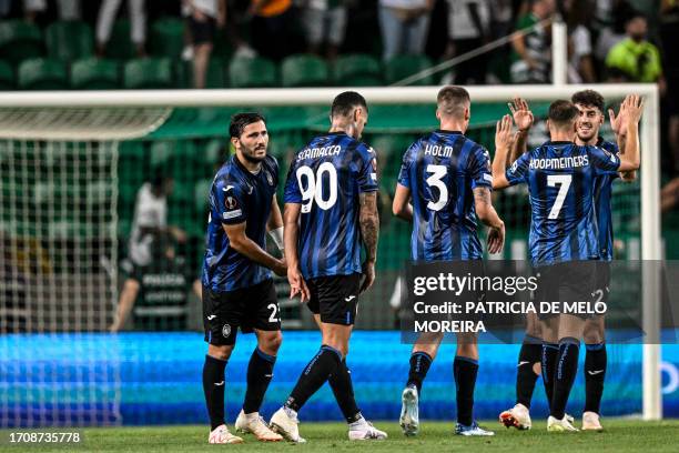 Atalanta's players celebrate their victory at the end the Europa League football match between Sporting CP vs Atalanta Bergamasca Calcio at Alvalade...