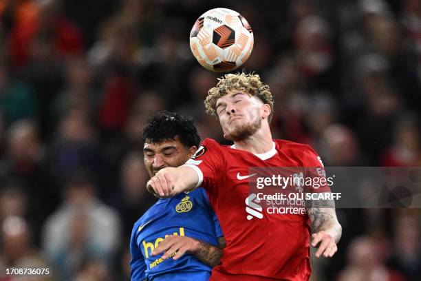 Union Saint-Gilloise's Spanish midfielder Cameron Puertas vies with Liverpool's English midfielder Harvey Elliott during the UEFA Europa League group...