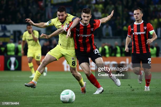 Mert Hakan Yandas of Fenerbahce in action against Sebastian Kosa of Spartak Trnava during the UEFA Europa Conference League Group H match between...