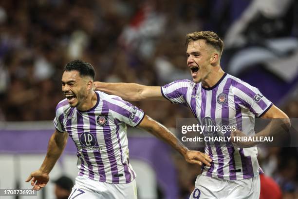 Toulouse's Chilean defender Gabriel Suazo celebrates after scoring his team's first goal during the UEFA Europa League 1st round day 2 group E...