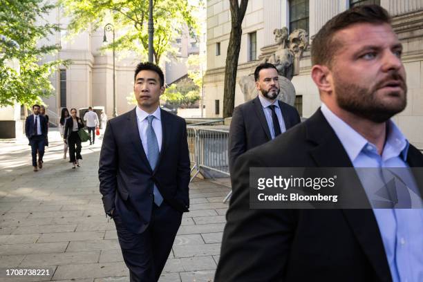 Matt Huang, co-founder and managing partner of Paradigm Operations LP, left, exits court in New York, US, on Thursday, Oct. 5, 2023. Former FTX...