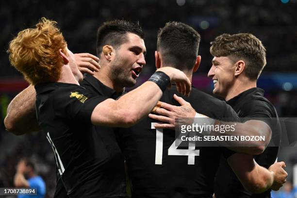 New Zealand's fly-half Finlay Christie, New Zealand's number eight Luke Jacobson, New Zealand's right wing Will Jordan and New Zealand's full-back...