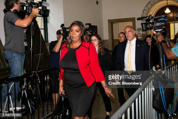 Letitia James, New York's attorney general, center, exits a courtroom at New York State Supreme Court in New York, US, on Thursday, Oct. 5, 2023....