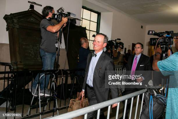 Chris Kise, attorney for former President Donald Trump, center, and Clifford Robert, attorney for Donald Trump Jr. And Eric Trump, right, exit a...