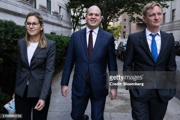 Nicolas Roos and Danielle Sassoon, assistant US Attorneys for the Southern District of New York, center and left, exit court in New York, US, on...
