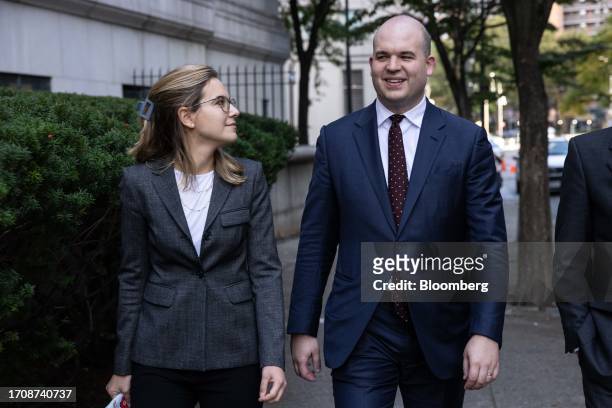 Nicolas Roos and Danielle Sassoon, assistant US Attorneys for the Southern District of New York, exit court in New York, US, on Wednesday, Oct. 5,...