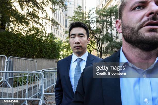 Matt Huang, co-founder and managing partner of Paradigm Operations LP, exits court in New York, US, on Thursday, Oct. 5, 2023. Former FTX Co-Founder...