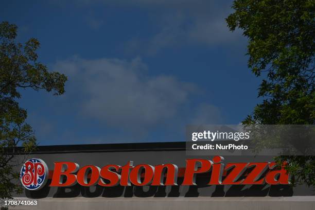 Boston Pizza logoseen in downtown Edmonton, on September 10 in Edmonton, Alberta, Canada.