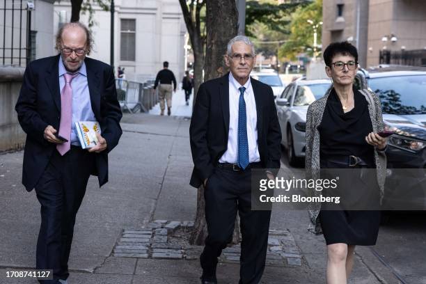Barbara Fried and Allan Joseph Bankman, parents of FTX Co-Founder Sam Bankman-Fried, center and right, exit court in New York, US, on Thursday, Oct....