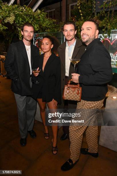 Brett Staniland, Amber Gill, Scott Staniland and guest attend The Diamond Lab's event to unveil the new 'Sealed With a X' collection with an evening...