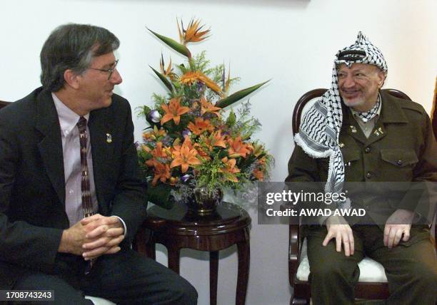 Middle East envoy Dennis Ross meets with Palestinian leader Yasser Arafat 15 November 1999 in the West Bank town of Ramallah. Ross arrived in...