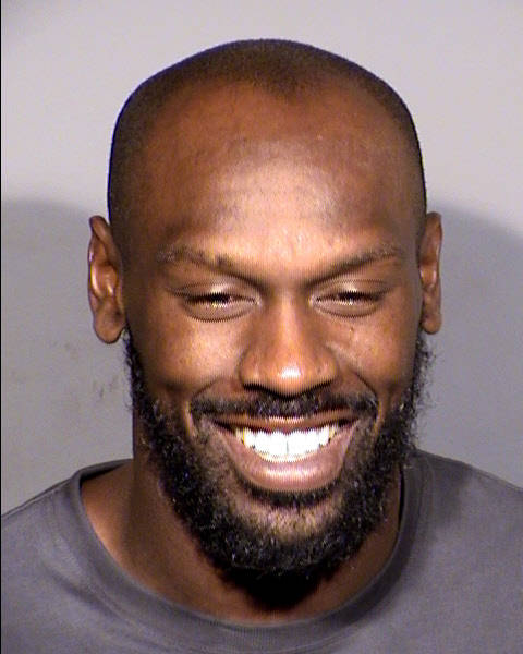 In this handout photo provided by the Las Vegas Metropolitan Police Department, Chandler Jones of the Las Vegas Raiders poses for his booking photo...