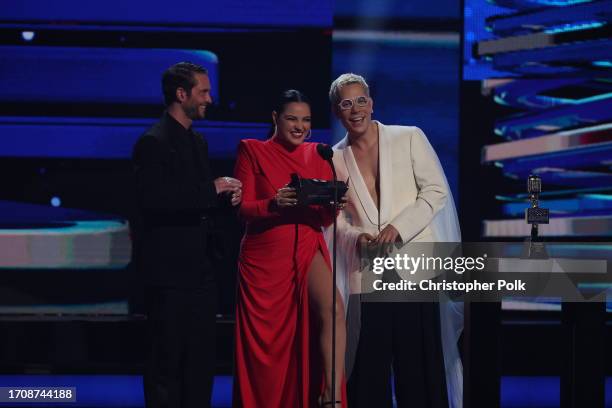 Christopher von Uckermann, Maite Perroni and Christian Chávez speak onstage at the Billboard Latin Music Awards 2023 held at Watsco Center on October...