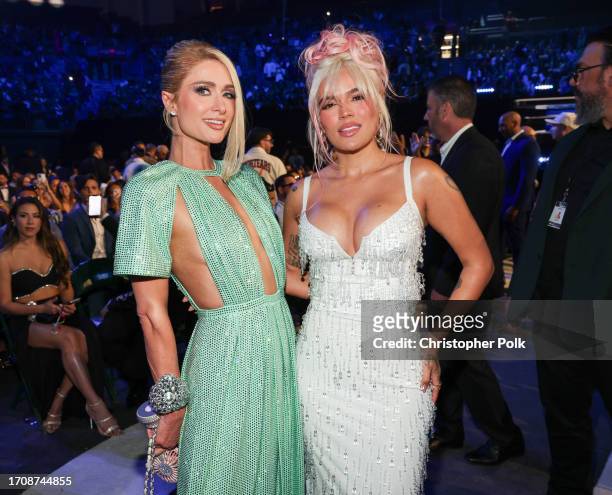 Karol G and Paris Hilton at the Billboard Latin Music Awards 2023 held at Watsco Center on October 5, 2023 in Coral Gables, Florida.